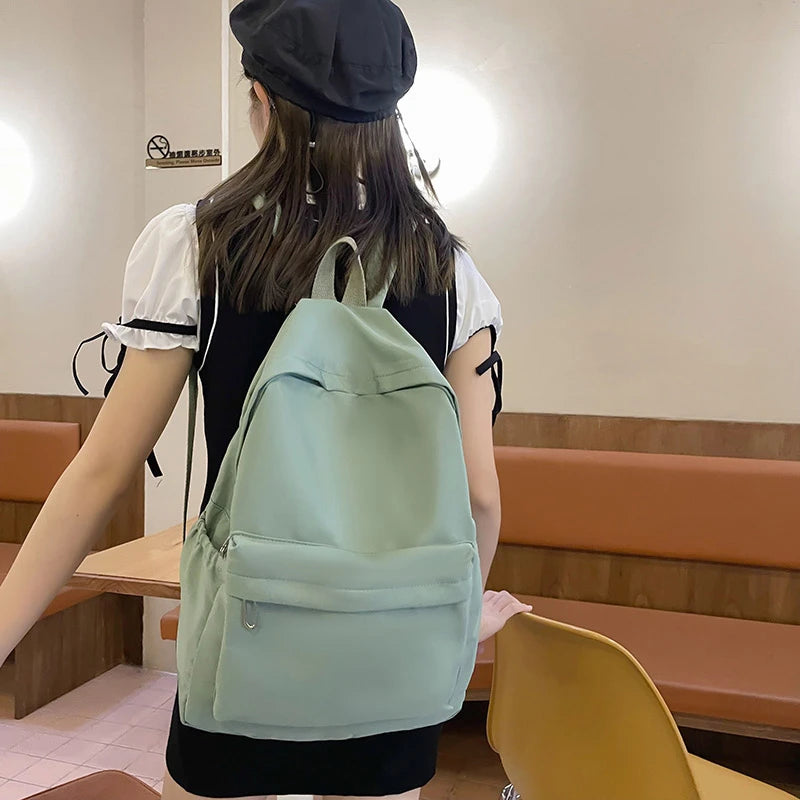 Mochila casual simples de cor sólida, leve e para estudantes do ensino médio, mochila multifuncional adequada para viagens, escola