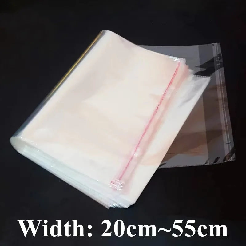 100PCS Sacos Adesivos Transparentes OPP de 20~55cm de Largura para Embalagem de Roupas, Calçados, Camisetas, Meias, Roupas Íntimas, Brinquedos, Livros e Presentes