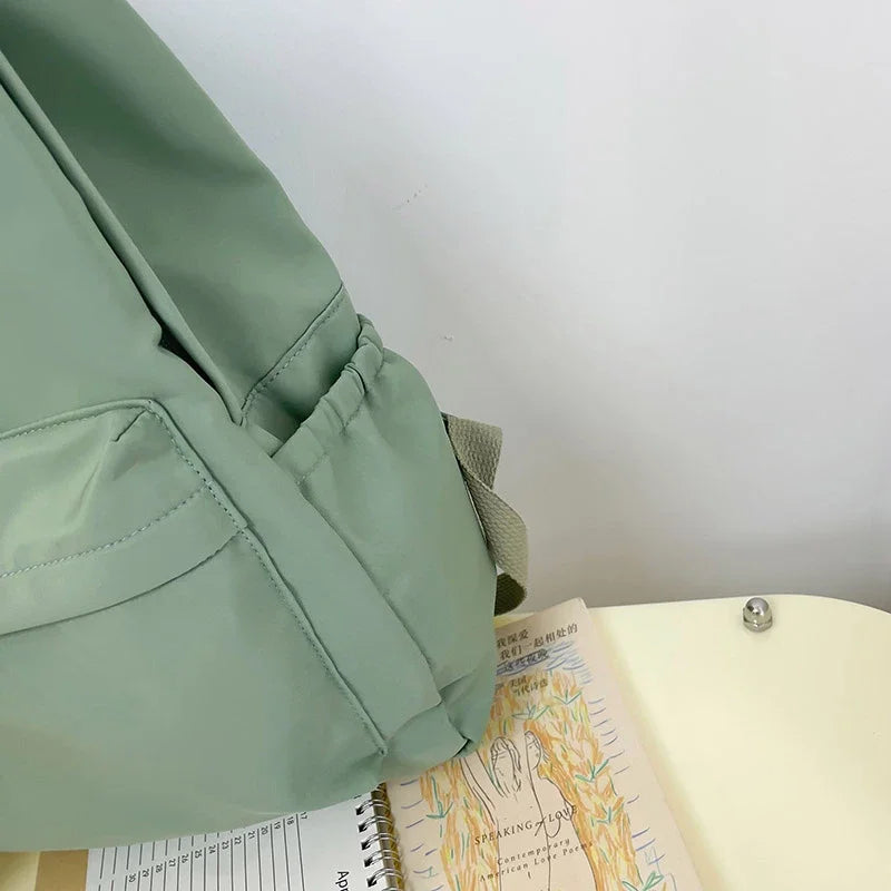 Mochila casual simples de cor sólida, leve e para estudantes do ensino médio, mochila multifuncional adequada para viagens, escola