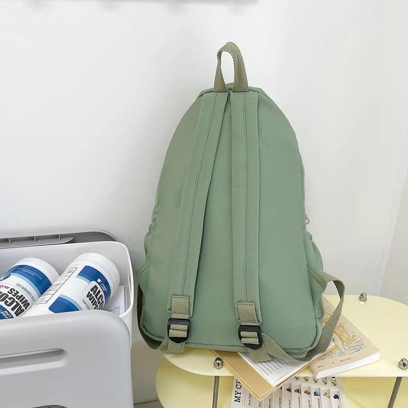 Mochila casual simples de cor sólida, leve e para estudantes do ensino médio, mochila multifuncional adequada para viagens, escola