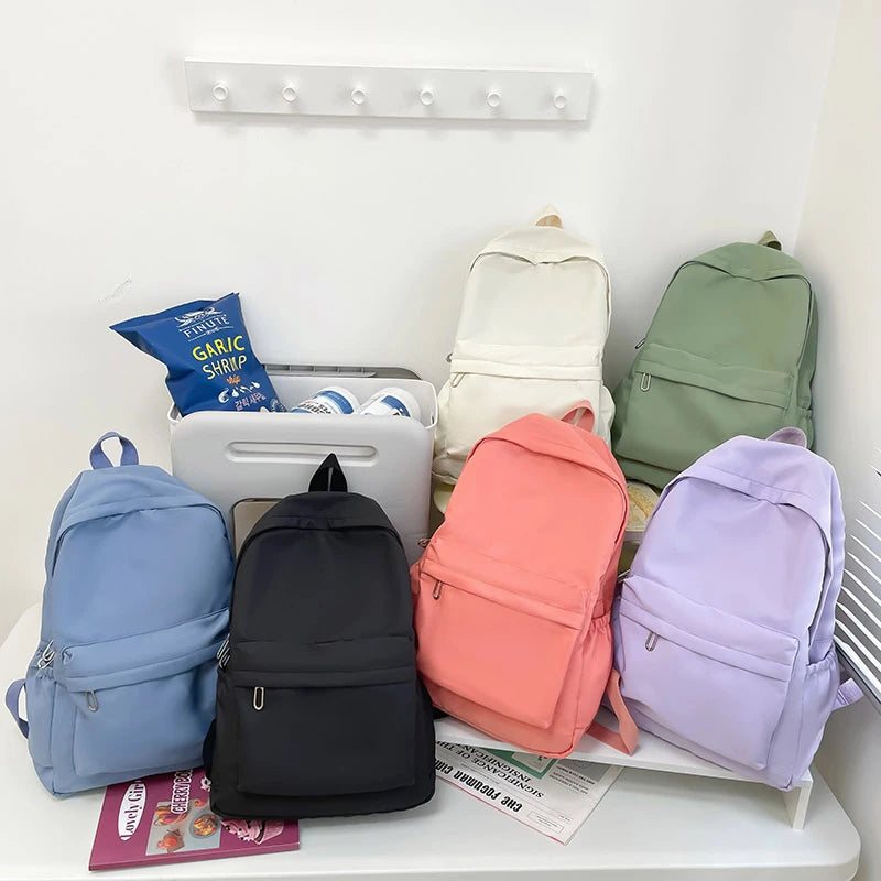 Mochila casual simples de cor sólida, leve e para estudantes do ensino médio, mochila multifuncional adequada para viagens, escola