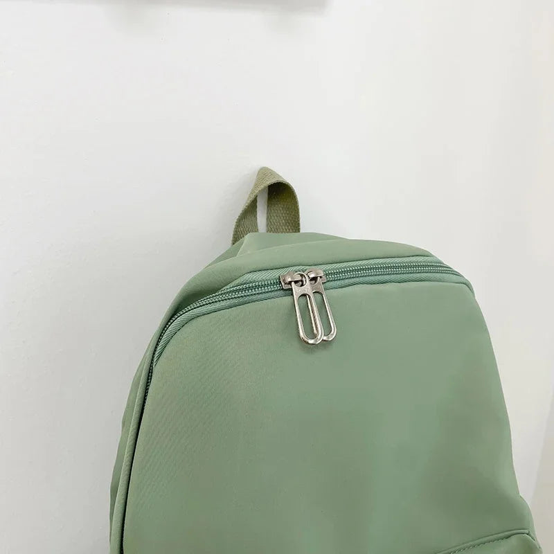 Mochila casual simples de cor sólida, leve e para estudantes do ensino médio, mochila multifuncional adequada para viagens, escola