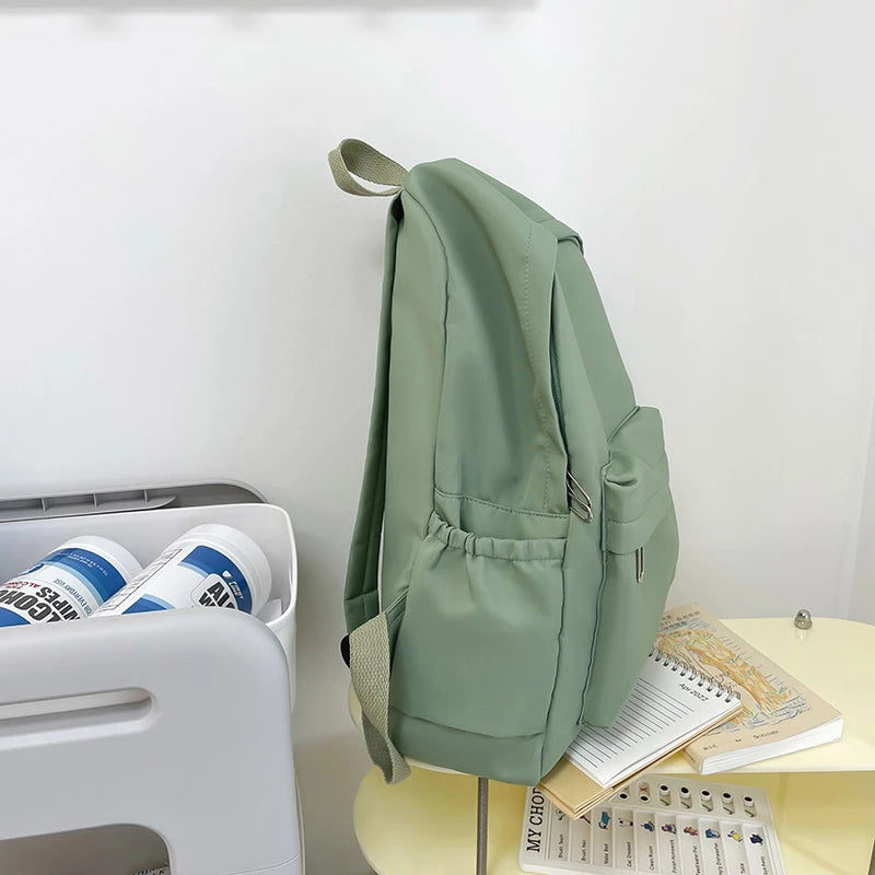 Mochila casual simples de cor sólida, leve e para estudantes do ensino médio, mochila multifuncional adequada para viagens, escola